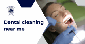 Woman receiving dental cleaning from a gloved dentist in a professional setting